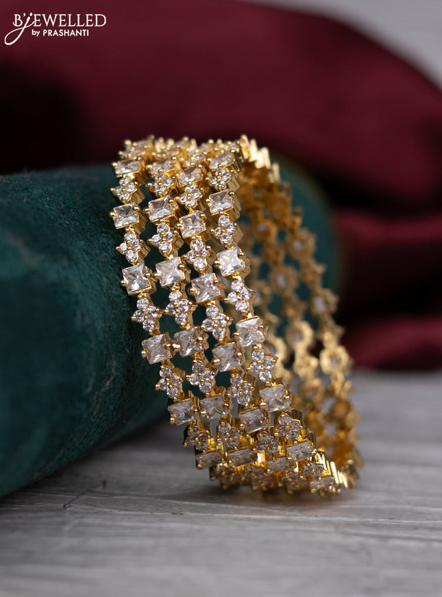 zircon bangle with gold finish and  cz stones