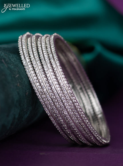 zircon bangle with cz stones