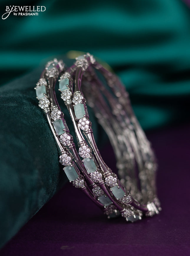 zircon bangle with mint green and cz stones