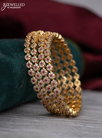 zircon bangle with gold finish and cz stones