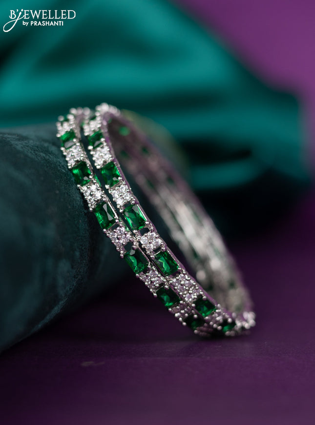 zircon bangle with emerald and cz stones