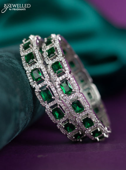 zircon bangle with emerald and cz stones