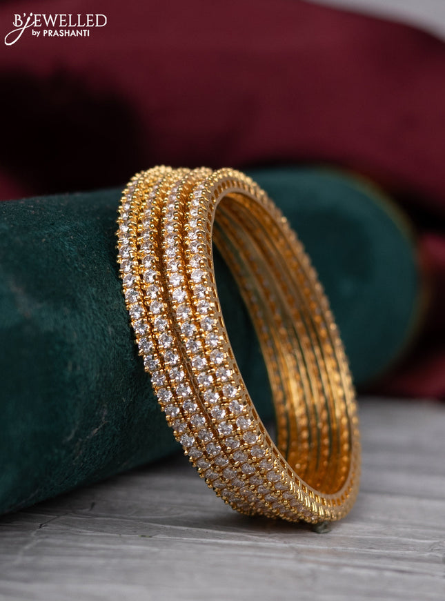 zircon bangle with gold finish and  cz stones