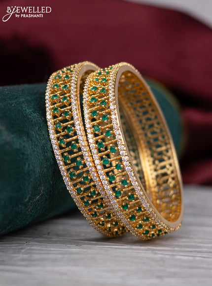 zircon bangle with emerald and cz stones gold finish