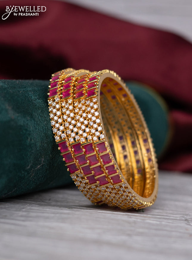 zircon bangle with gold finish and  cz stones