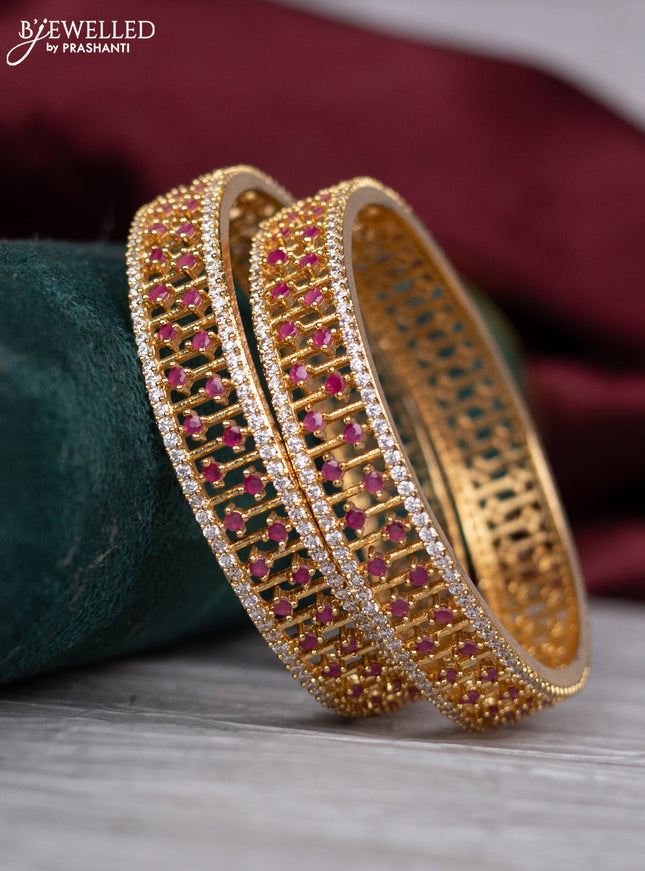 zircon bangle with gold finish and  cz stones
