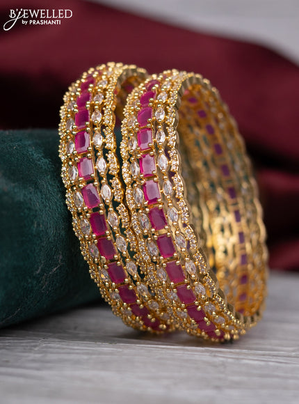 zircon bangle with gold finish and  cz stones