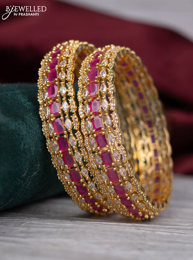 zircon bangle with gold finish and  cz stones