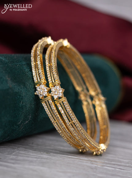 zircon bangle with gold finish and  cz stones
