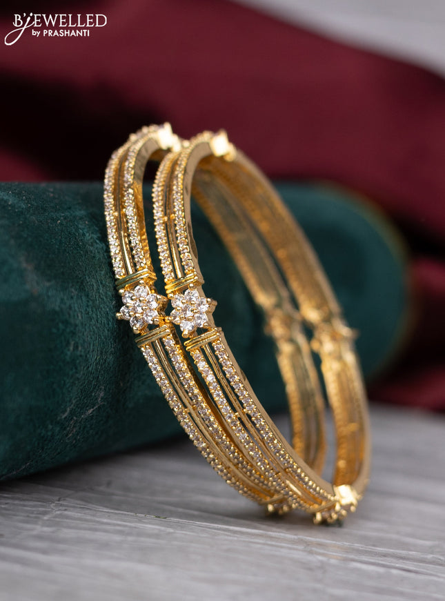 zircon bangle with gold finish and  cz stones
