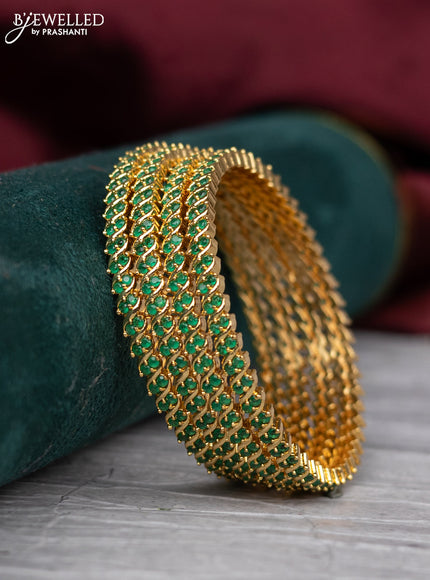 zircon bangle with emerald and cz stones gold finish