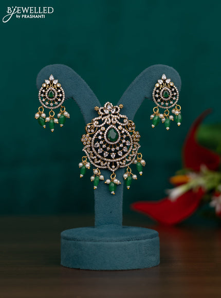 Pendant set with emerald & cz stones and beads hangings in victorian finish