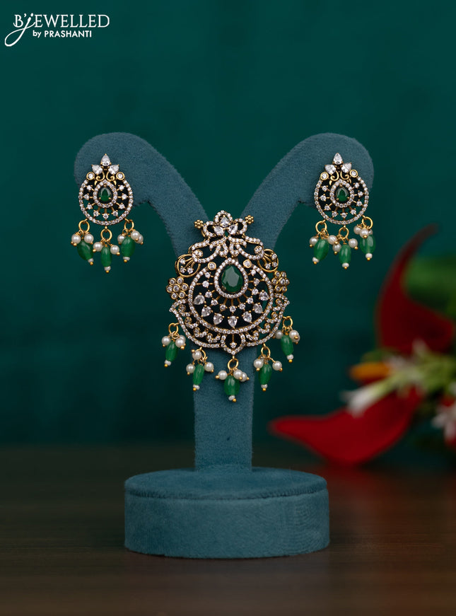 Pendant set with emerald & cz stones and beads hangings in victorian finish