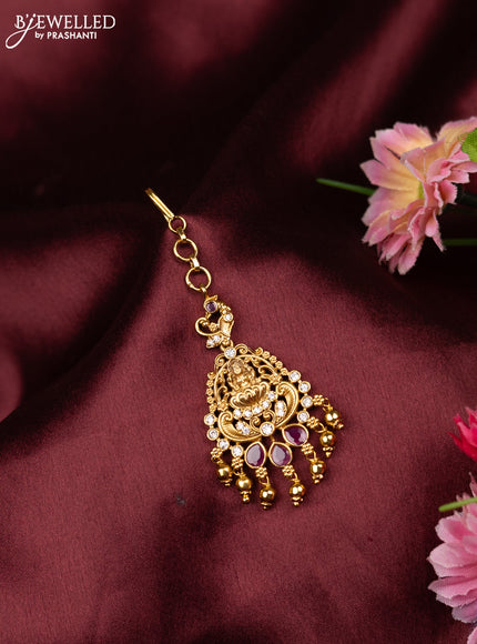 Antique maang tikka lakshmi design with pink kemp & cz stones and golden beads hangings