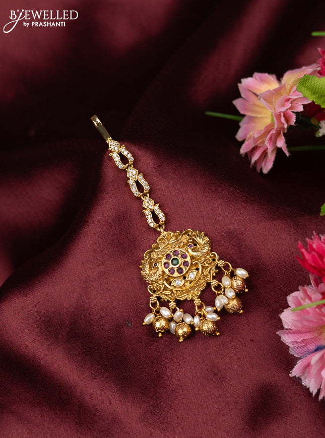 Antique maang tikka peacock design with kemp & cz stones and golden beads hangings