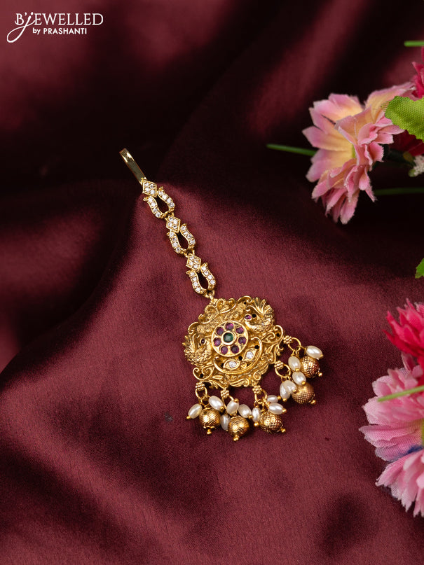 Antique maang tikka peacock design with kemp & cz stones and golden beads hangings