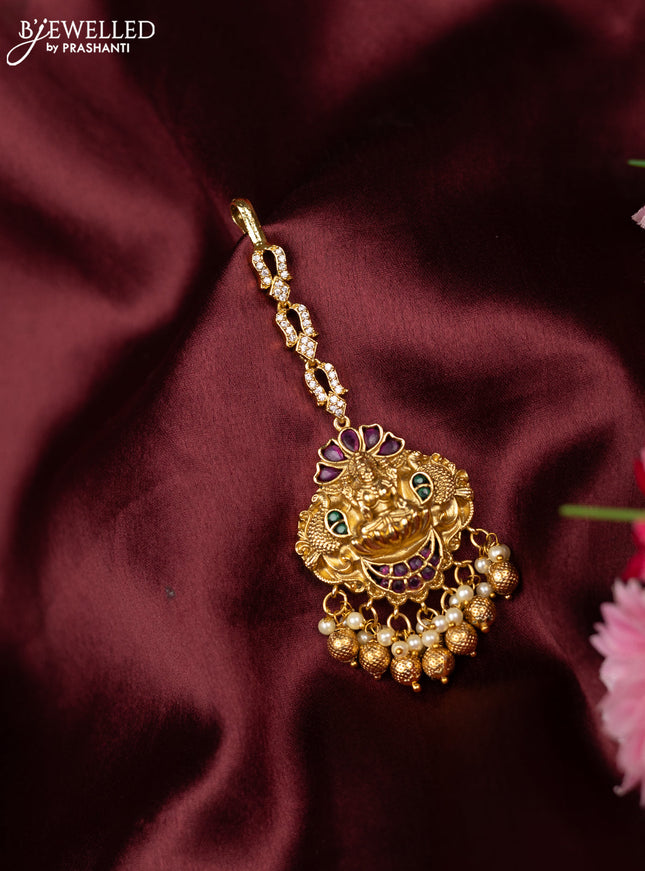 Antique maang tikka lakshmi & peacock design with kemp and cz stones and pearl hangings