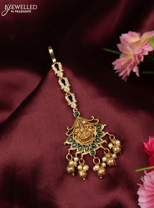 Antique maang tikka lakshmi design with emerald & cz stones and golden beads hangings