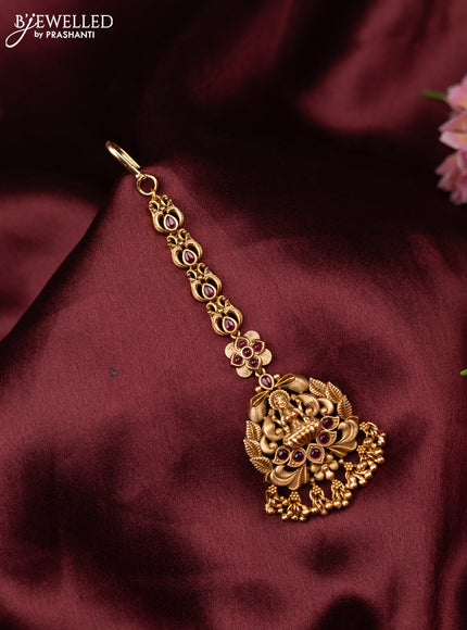 Antique maang tikka lakshmi design with pink kemp and golden beads hangings