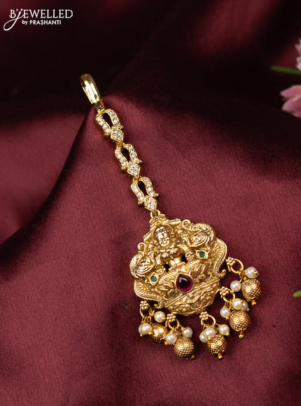 Antique maang tikka lakshmi design with kemp & cz stones and golden beads hangings