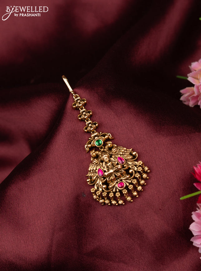 Antique maang tikka lakshmi design with kemp stones and golden beads hangings