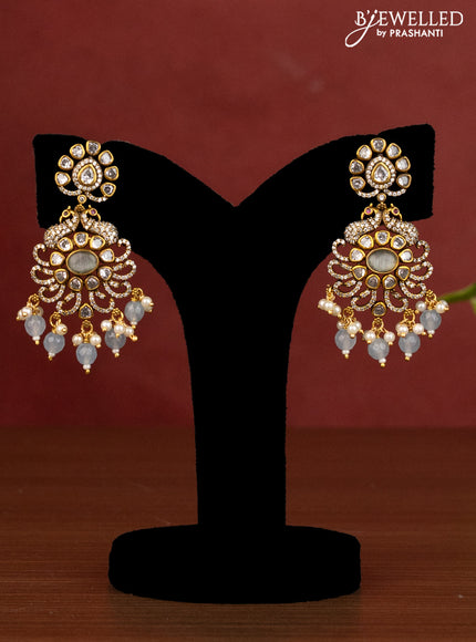 Beaded ice blue triple layer necklace peacock design with cz stones and beads hanging