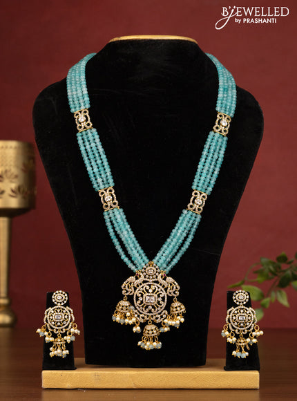 Beaded light blue multilayer necklace peacock design with cz stones and beads hanging