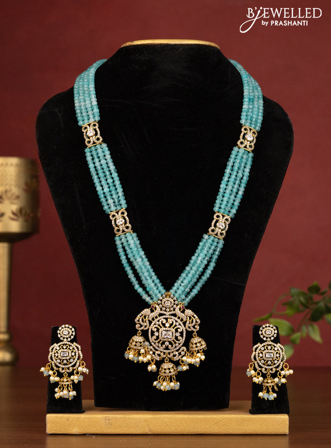Beaded light blue multilayer necklace peacock design with cz stones and beads hanging