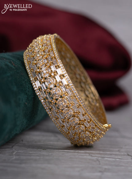 Zircon bangle with cz stones in gold finish