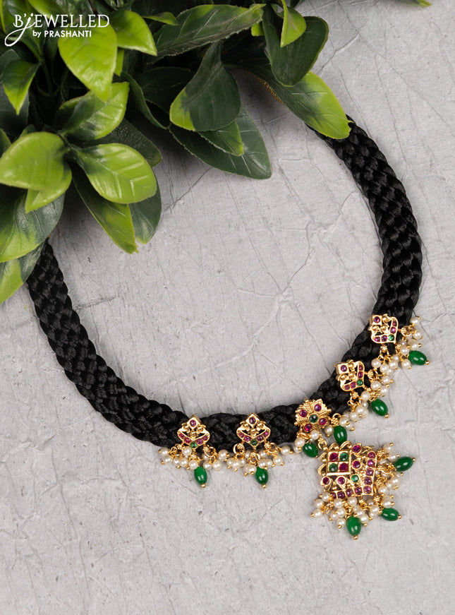Black thread necklace with kemp stones and pearl hangings without earrings
