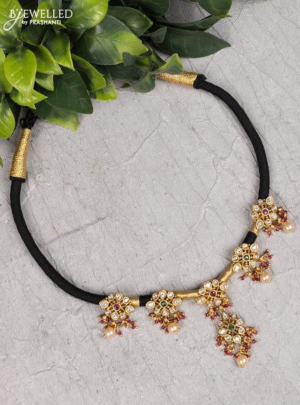 Black thread necklace with kemp & cz stones and crystal beads hanging without earrings