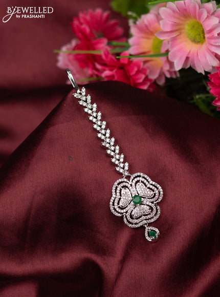 Zircon manng tikka floral design with emerald and cz stones