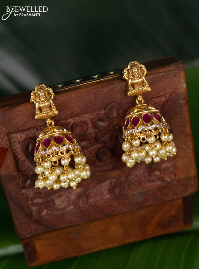 Antique jhumka lakshmi design with pink kemp & cz stones and pearl hanging