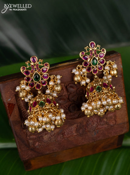 Antique jhumka peacock design with kemp stones and golden beads hanging