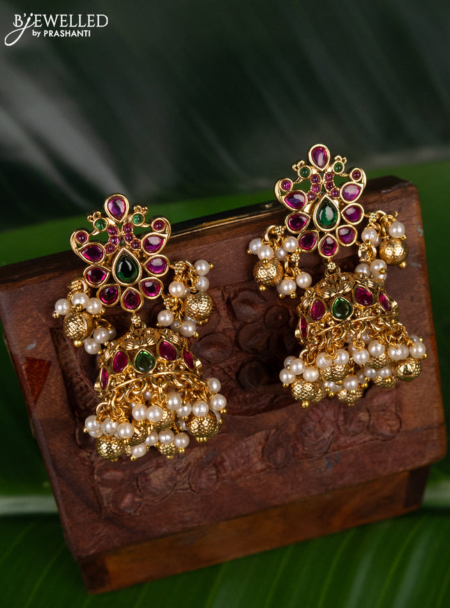 Antique jhumka peacock design with kemp stones and golden beads hanging