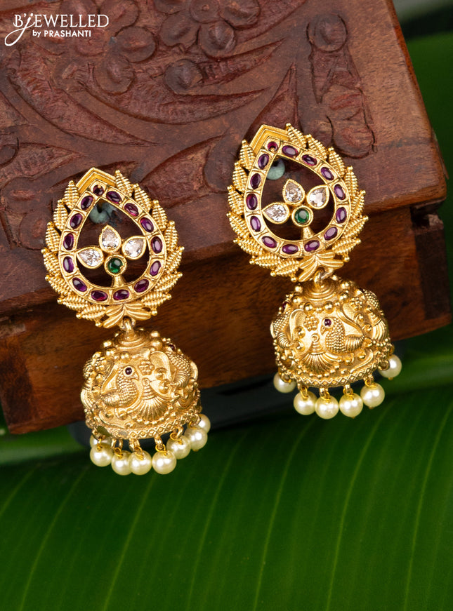 Antique jhumka peacock design with kemp & cz stones and pearl hangings