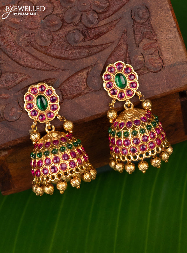 Antique jhumka with kemp stones and golden beads hanging