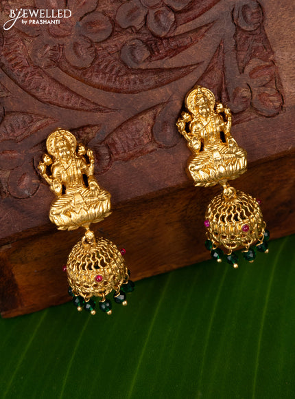 Antique jhumka lakshmi design with pink kemp stones and green beads hanging