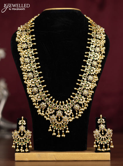 Antique guttapusalu haaram floral design with emerald & cz stones and pearl hangings