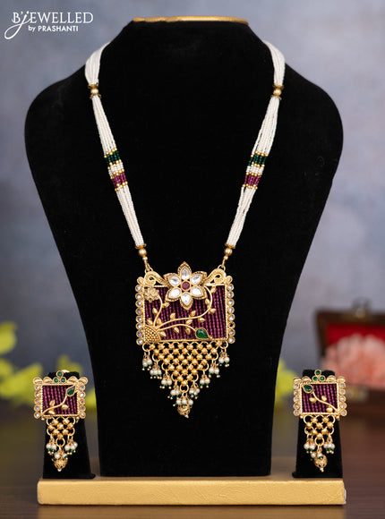 Pearl necklace floral design with kemp & kundan stones and pearl & golden beads hanging