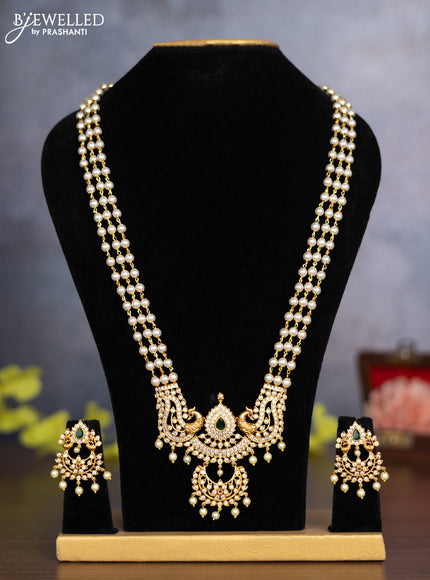 Pearl haaram peacock design with kemp & cz stones and pearl hangings