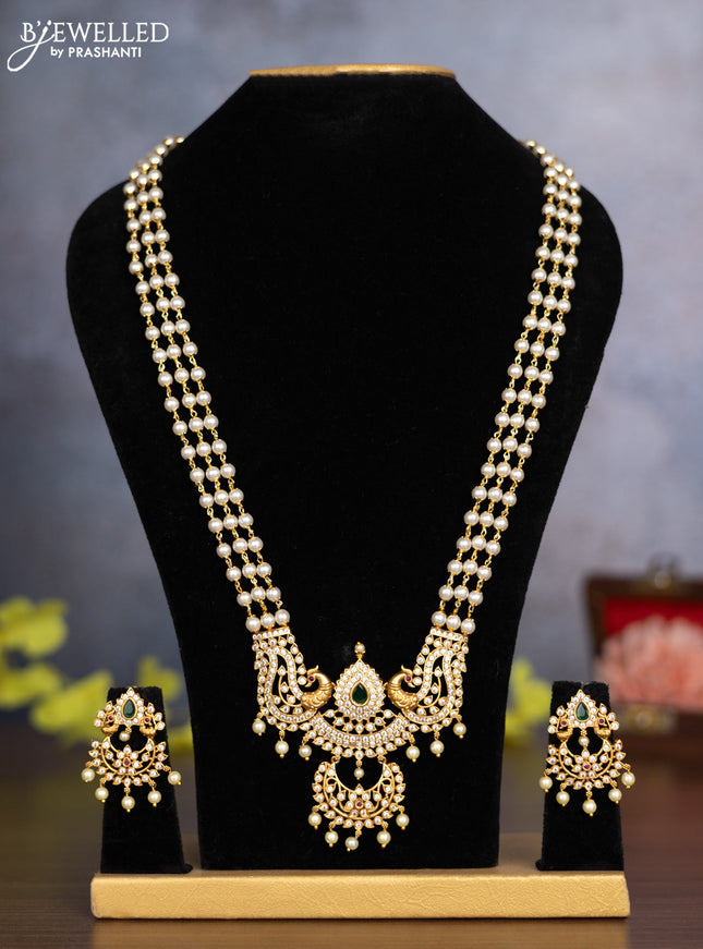 Pearl haaram peacock design with kemp & cz stones and pearl hangings