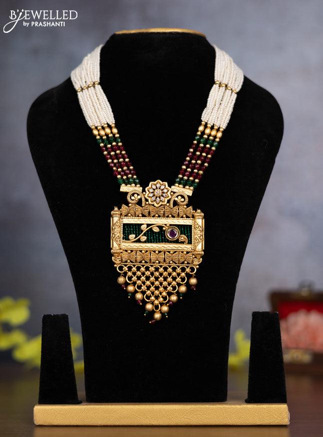 Pearl necklace with ruby & cz stones and golden beads hanging without earrings