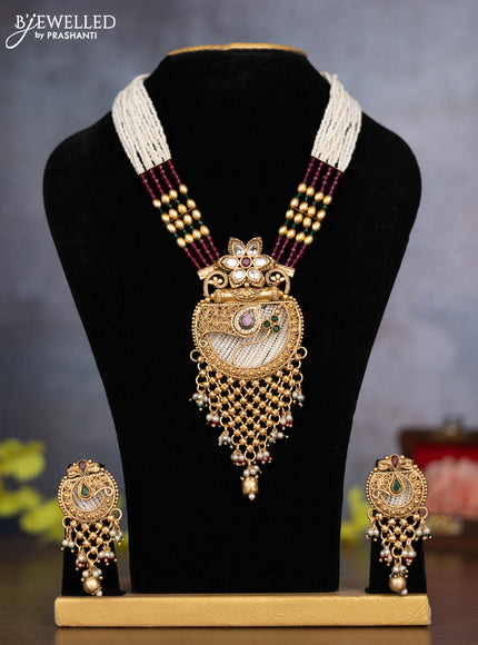 Pearl necklace floral design with kemp & kundan stones and pearl & golden beads hanging