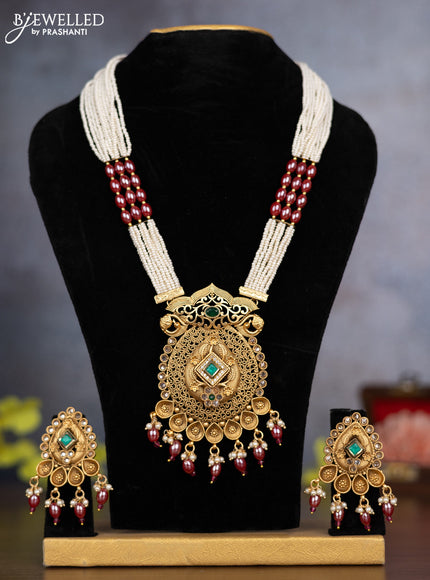 Pearl necklace with emerald & cz stones and pearl & pink beads hanging