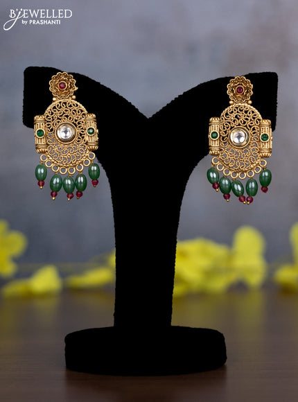 Pearl necklace with kemp & cz stones and green beads hanging