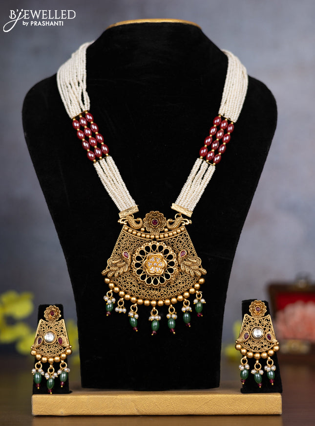 Pearl necklace floral design with ruby & cz stones and pearl & green beads hanging