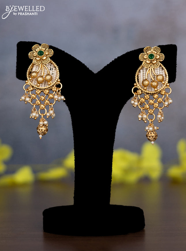 Pearl necklace floral design with kemp & cz stones and pearl & golden beads hanging