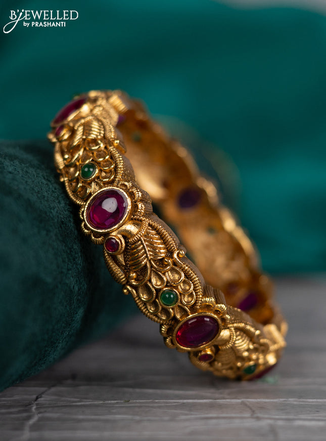 Antique screw type bangle peacock design with kemp stones