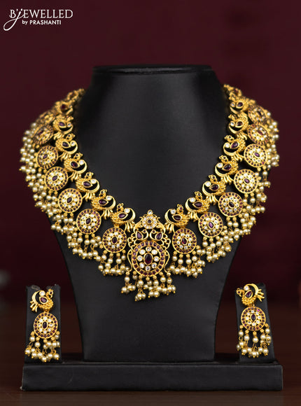 Antique guttapusalu necklace peacock design with pink kemp & cz stones and pearl hangings
